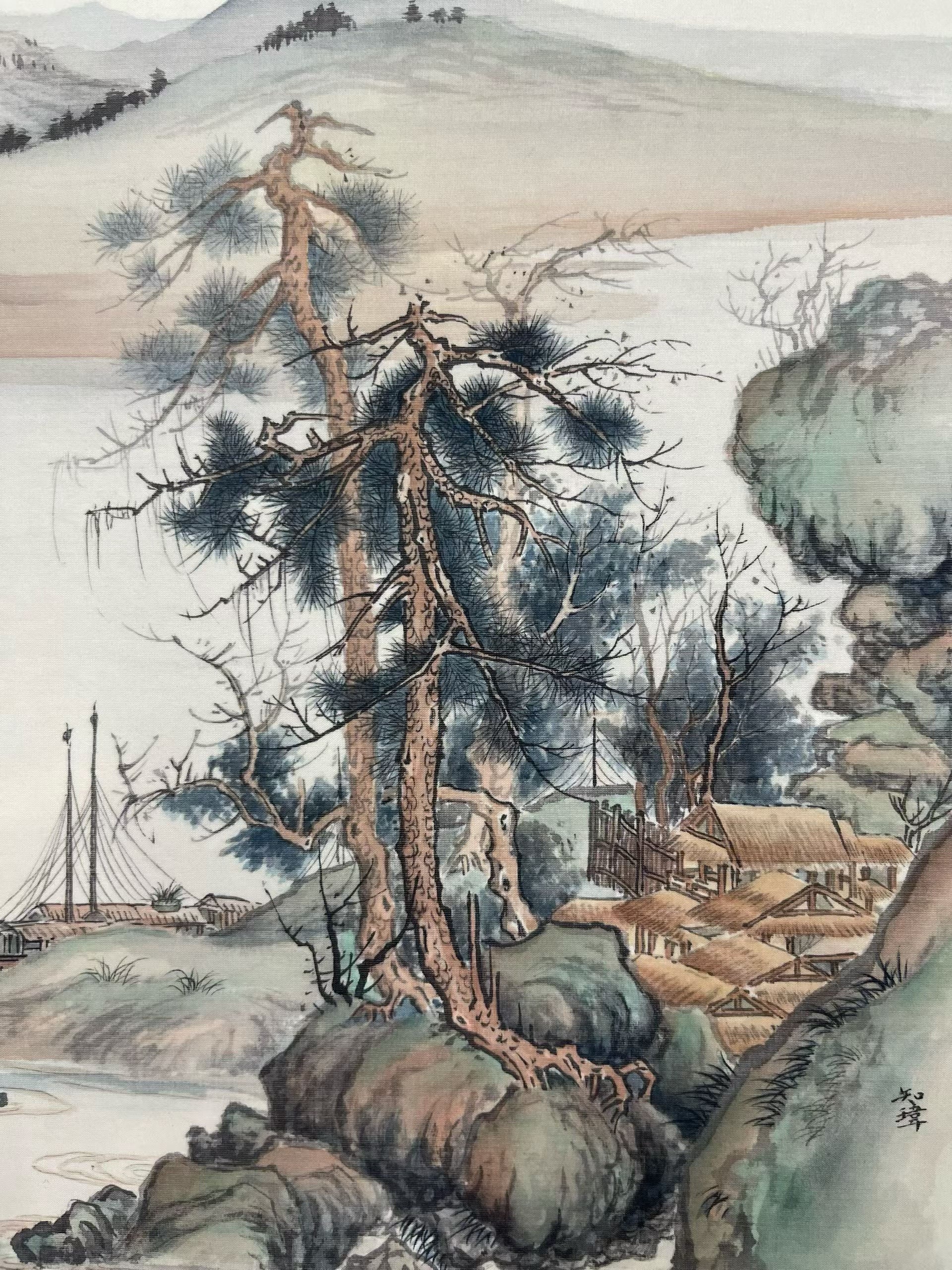 Traditional Chinese landscape painting with trees, mountains, and a village.