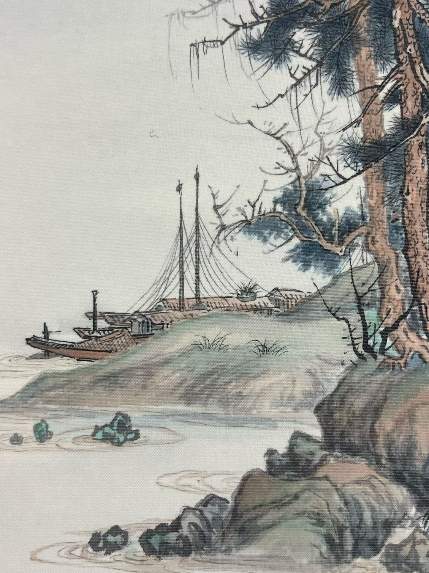 Traditional Chinese landscape painting with a boat on water and trees.